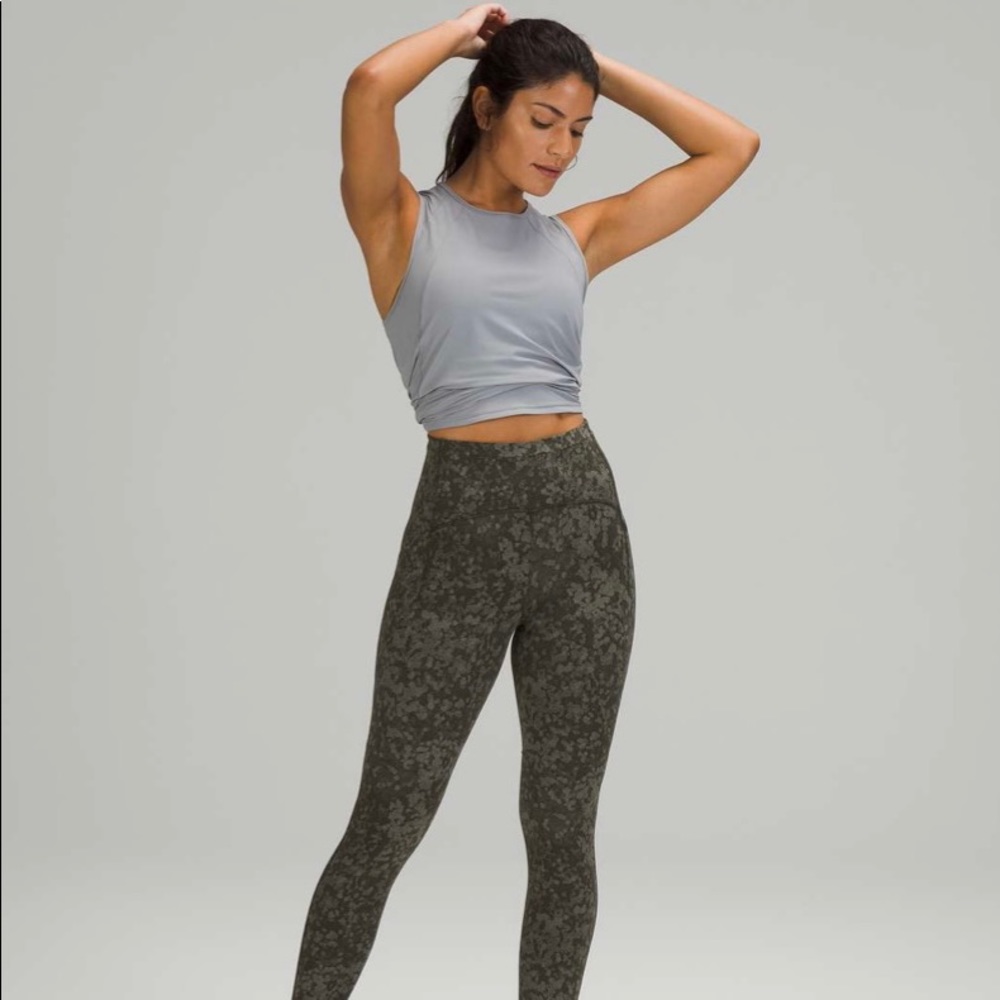 EUC Lululemon swift speed HR crop 23” Sz2